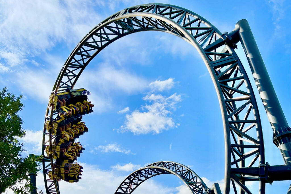 People upside down on a roller coaster